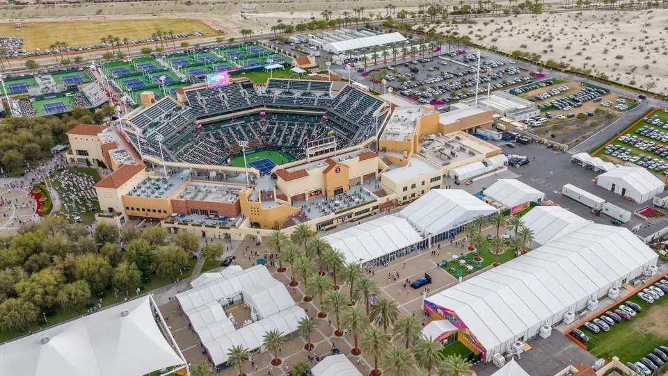 Aerial view of Indian Wells Tennis Garden, showing Stadium 1, practice courts, and the surrounding event grounds.